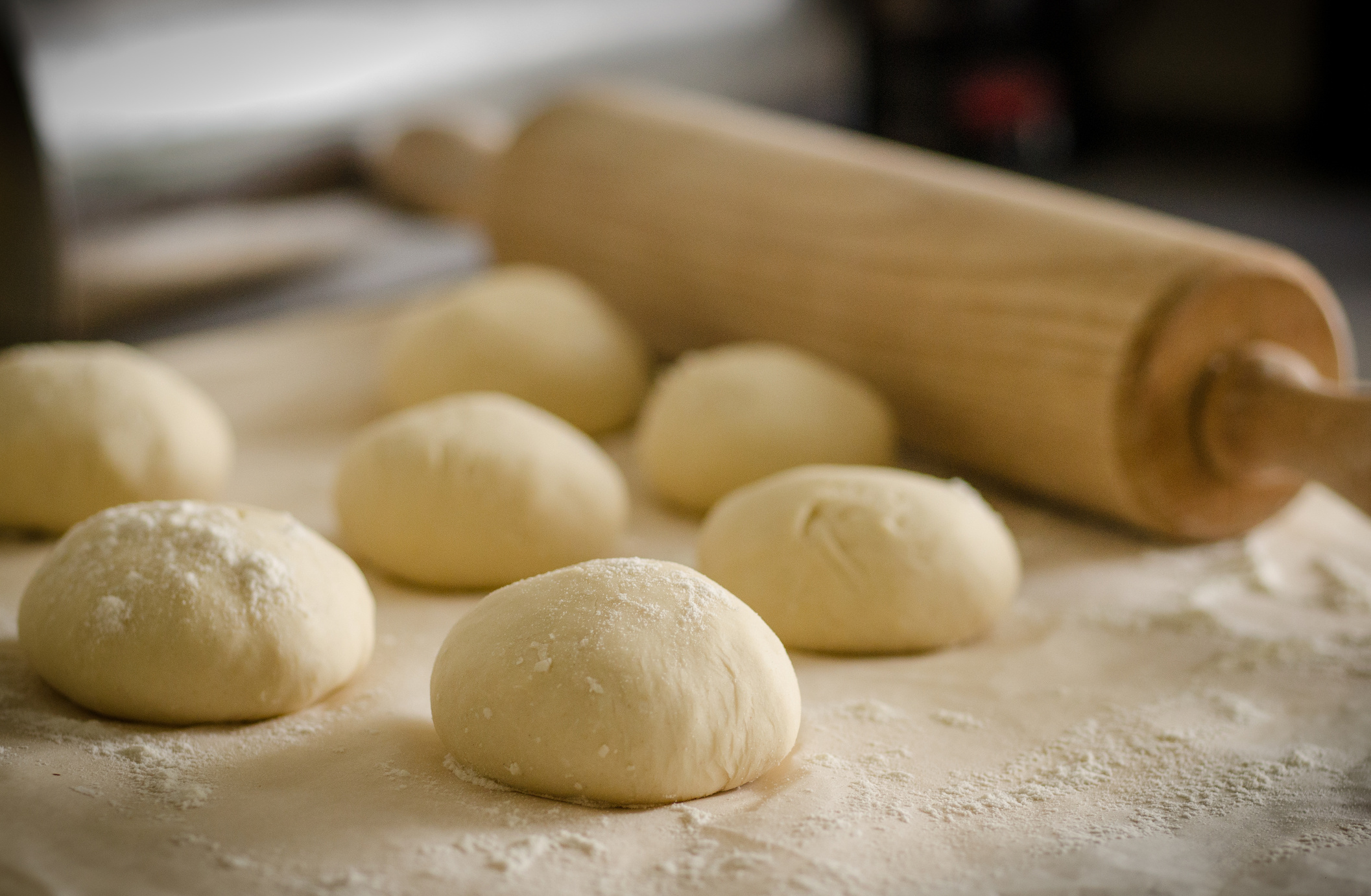 Wheat Beside Brown Wooden Rolling Pin